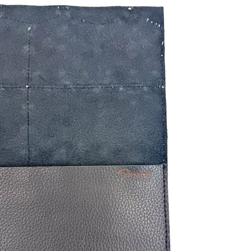 CARTERA DE MANO NEGRA CON PIEL TRENZADA